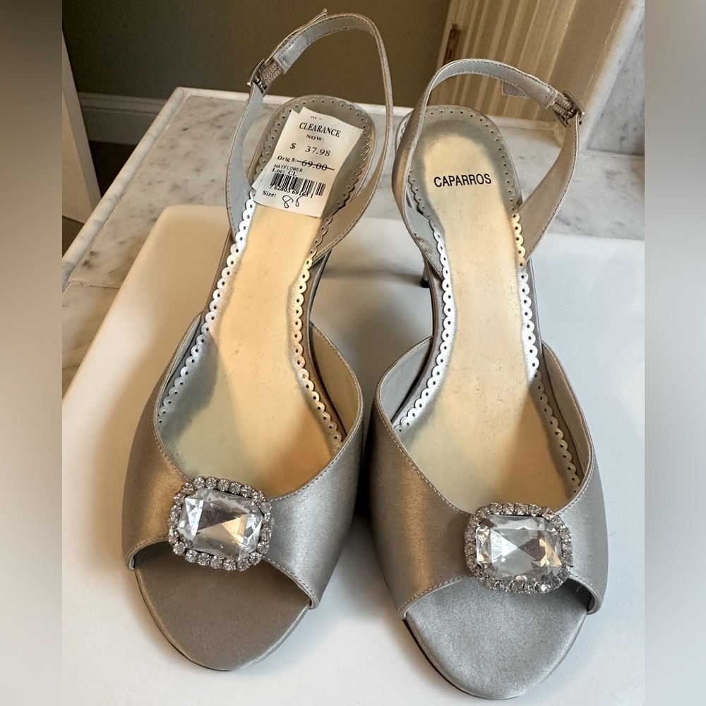 New with tags! Silver sling backs